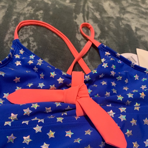 Blue with a iridescent star print bathing suit. - Picture 3 of 5